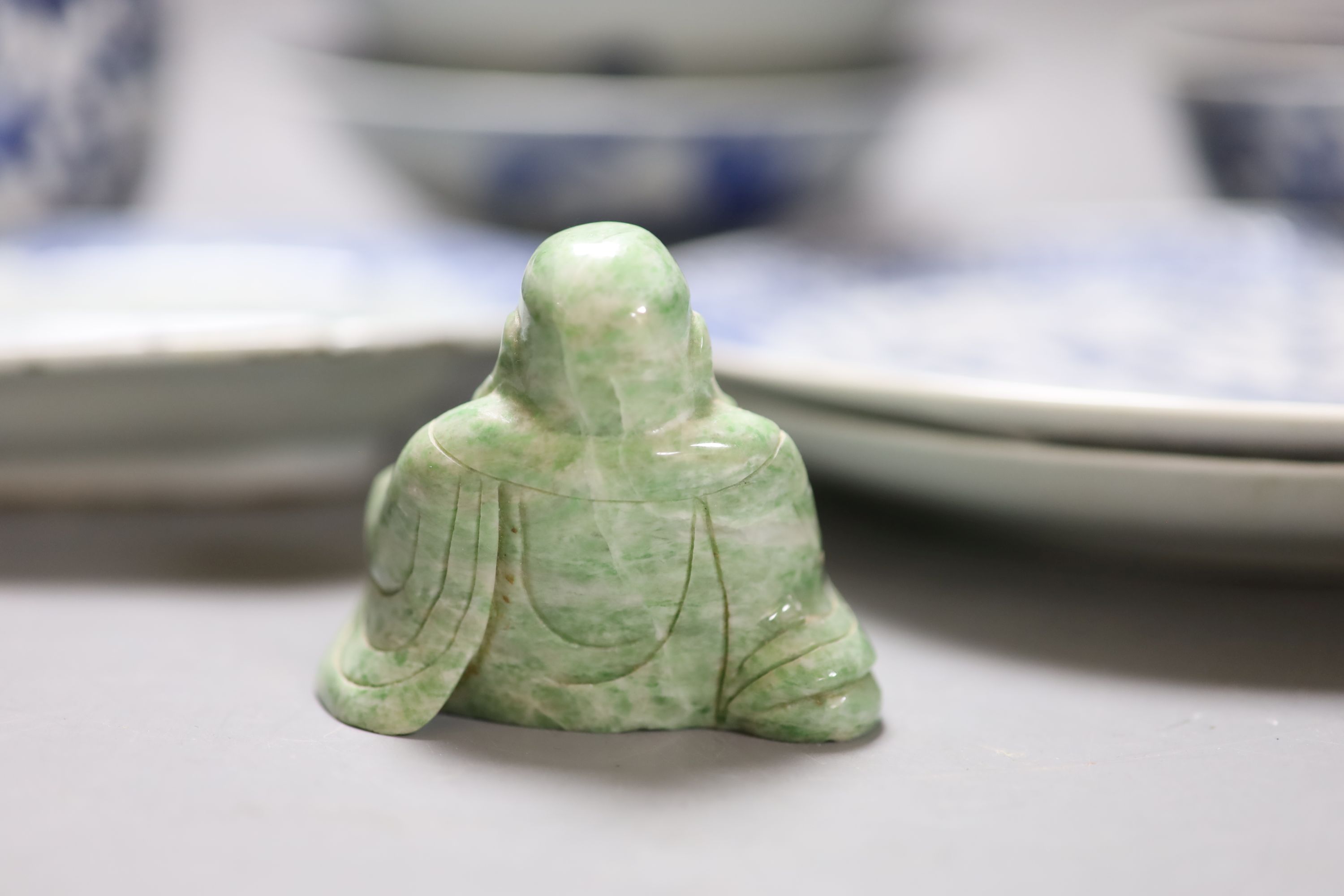 A quantity of mixed Chinese blue and white, together with a hardstone carving of Buddha